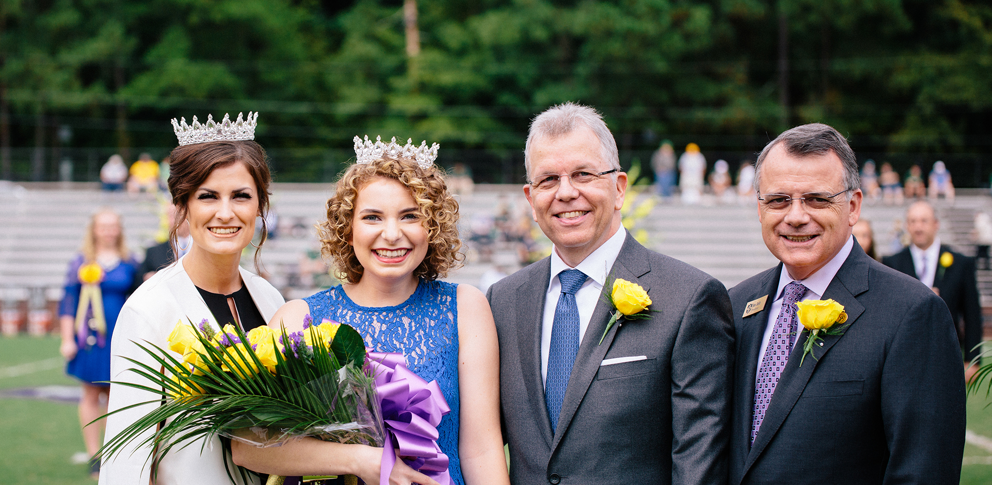 Hannah Bunch (far left), 2017 Ouachita Homecoming Queen, crowned Molly Boone as 2018 Ouachita Homecoming Court. Boone was escorted by her father, Tim Boone, and recognized by Ouachita President Ben Sells (far right).