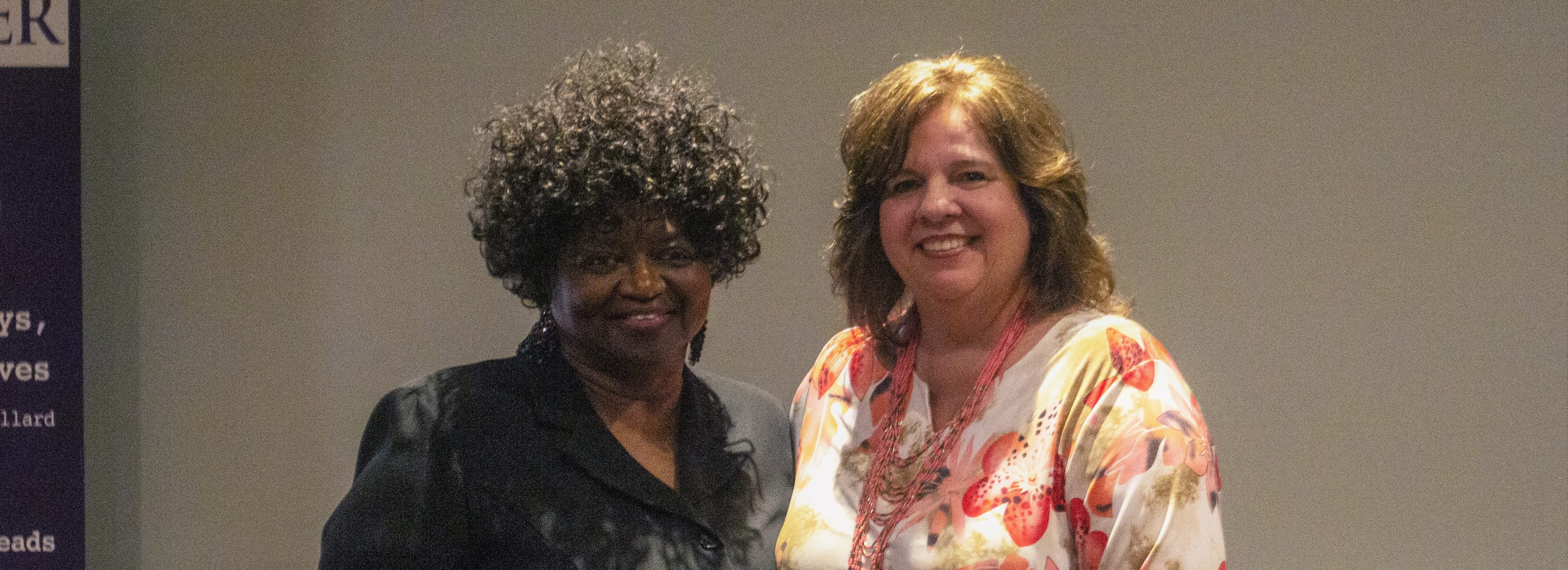 Pictured are honoree Linda Burns (left) and Donna Reynolds, director of the Foster Grandparent program at Ouachita, during the Elrod Center’s annual community service awards banquet. Burns was honored for 25 years of service with the program.