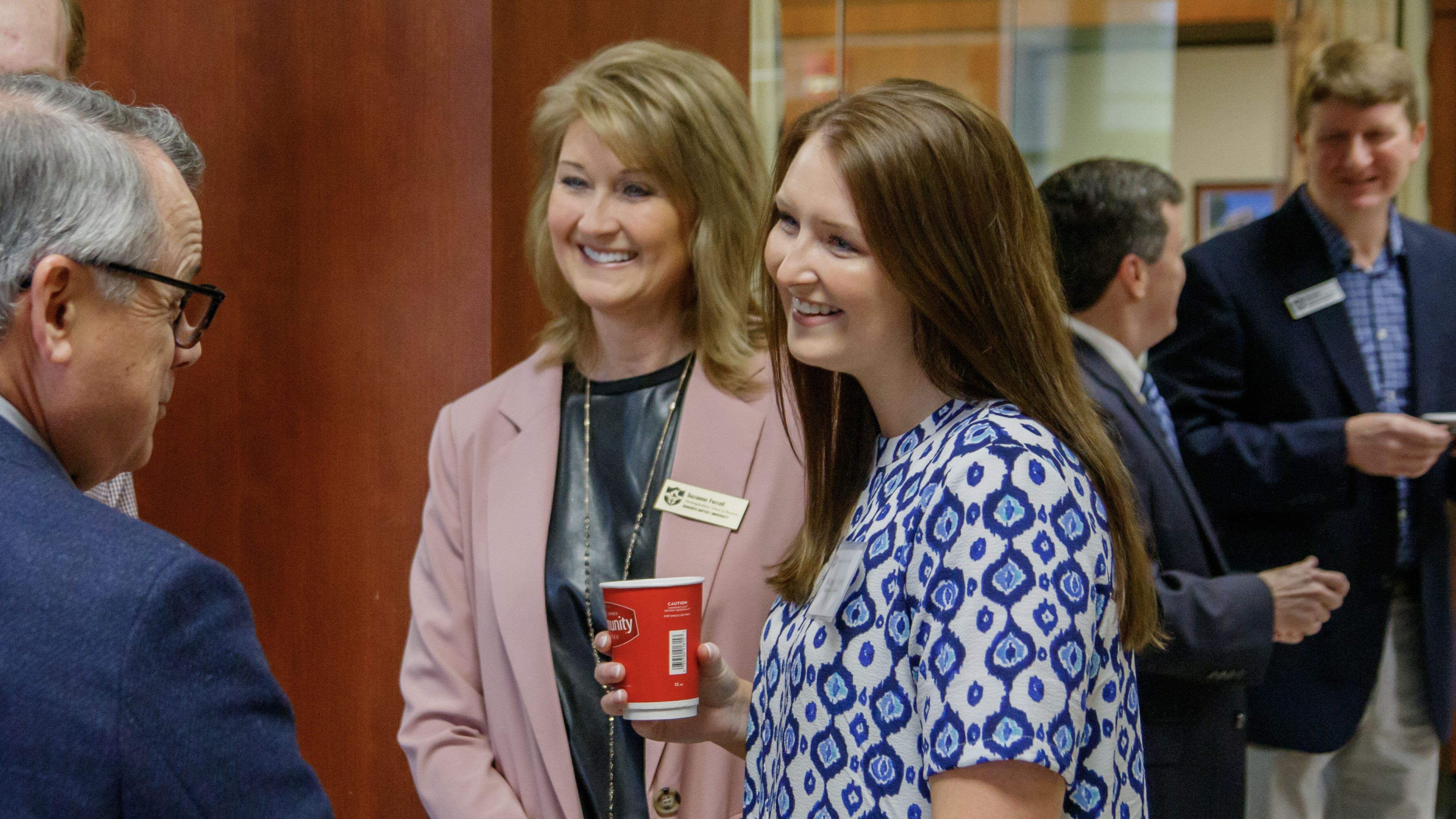 Michaelyn Ferrell with her mother, Suzanne, during a Business Administration Day breakfast at the Hickingbotham School of Business