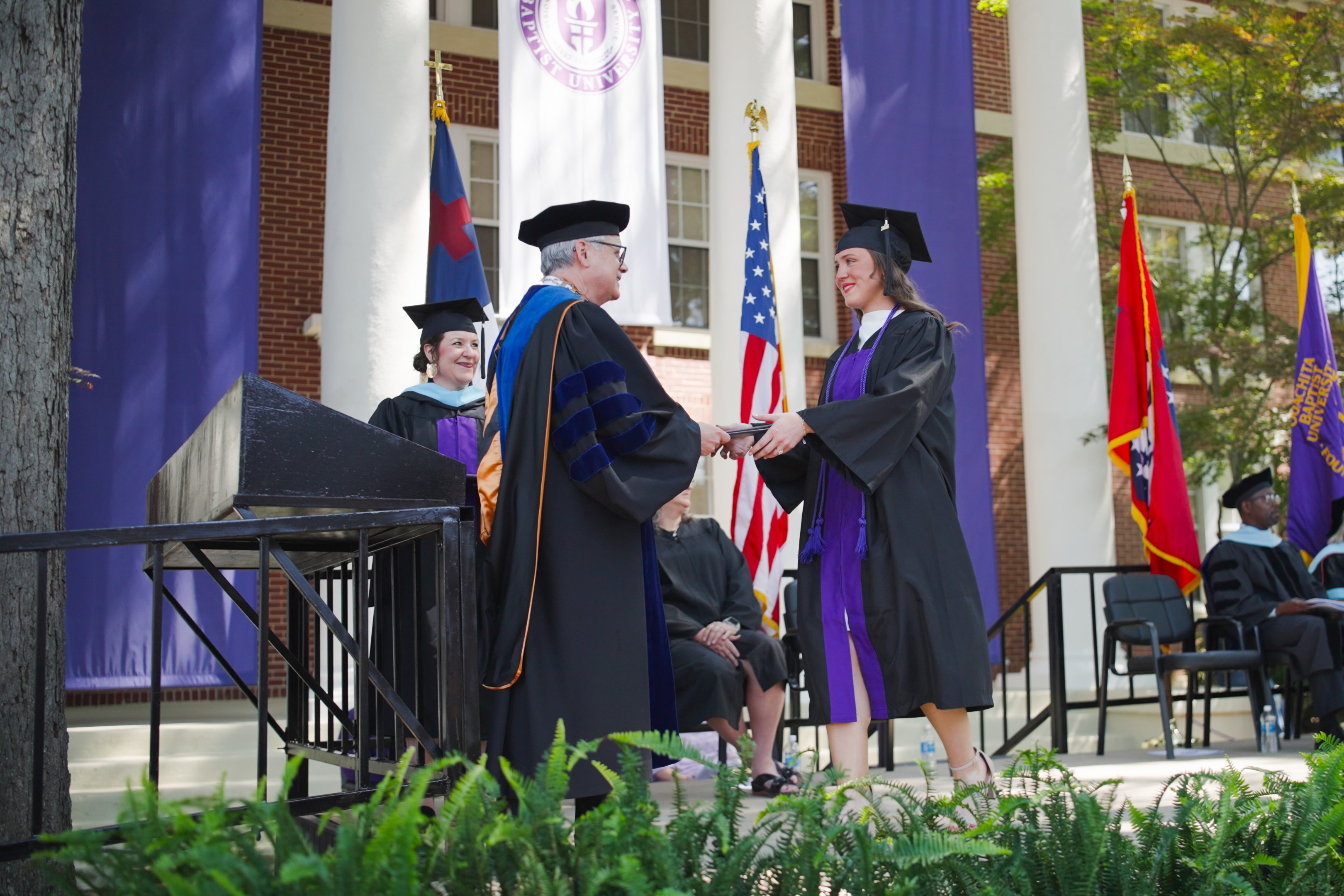 Brooklin Pitard receiving her degree