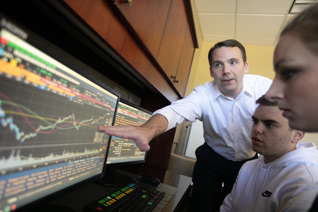 Finance professor with students