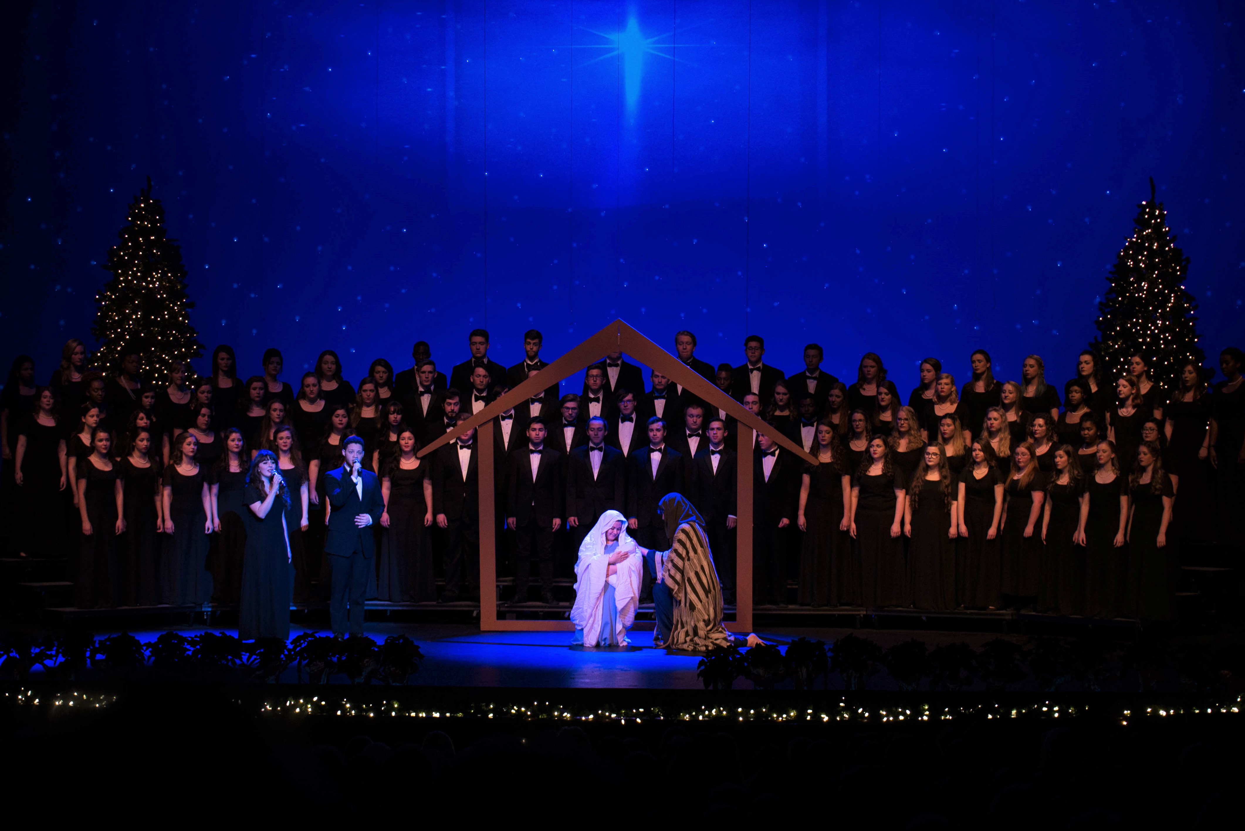 Students reenact Jesus' birth as the concert choir sings