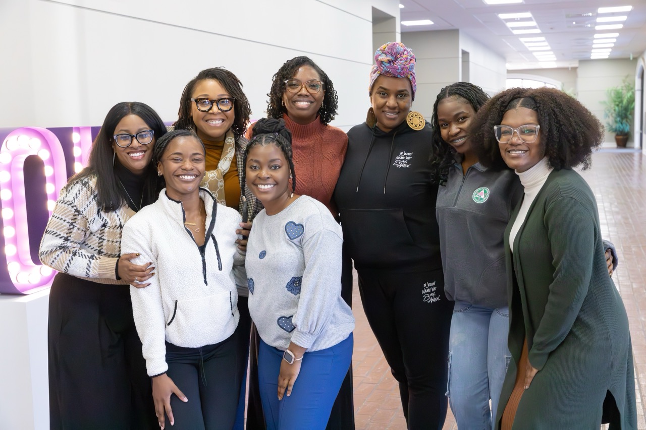 Students, faculty and staff with James after the lunch