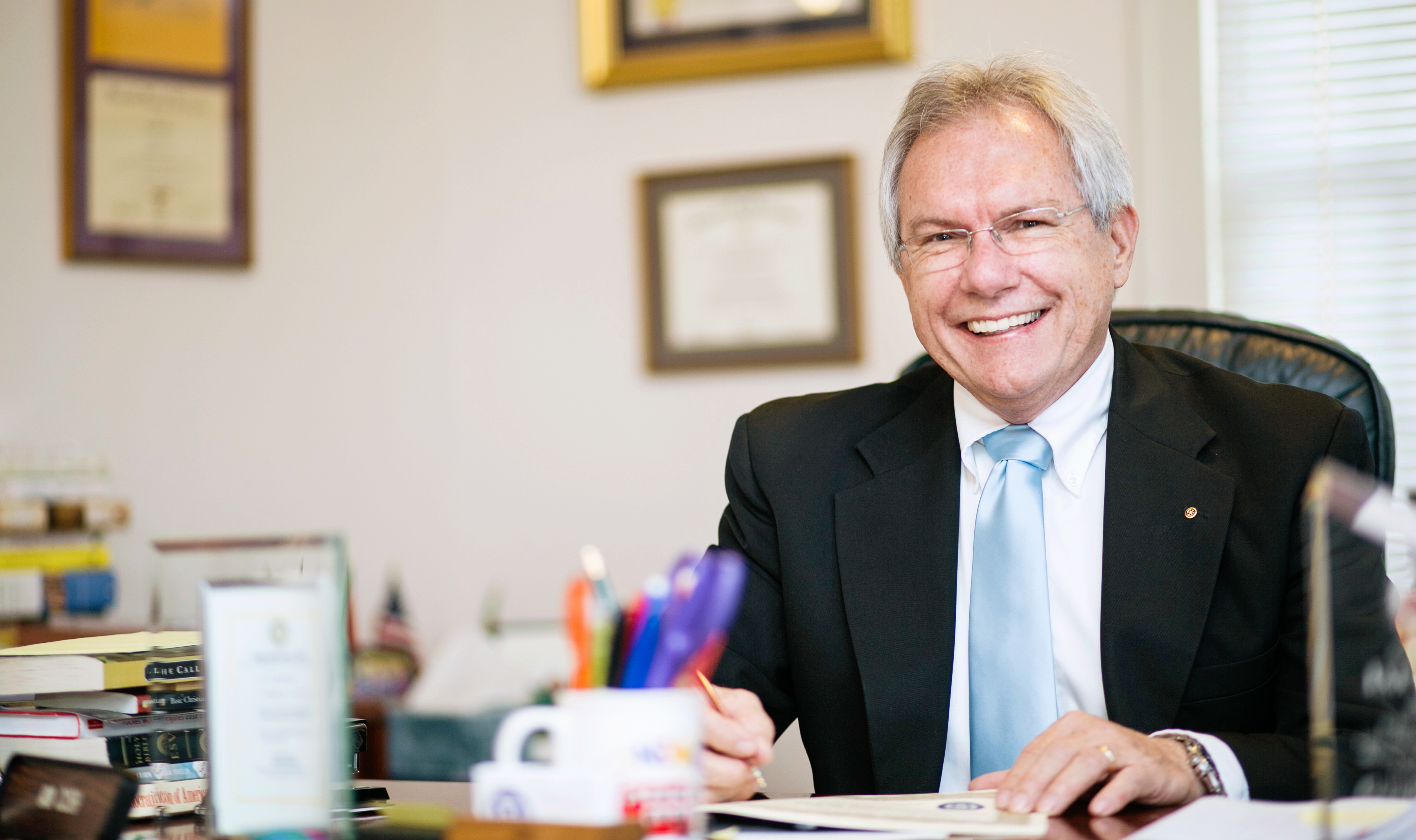 Ian Cosh at his desk in the Elrod Center at Ouachita Baptist University