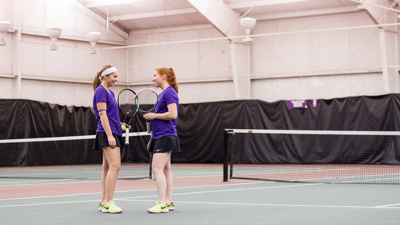 Students playing tennis