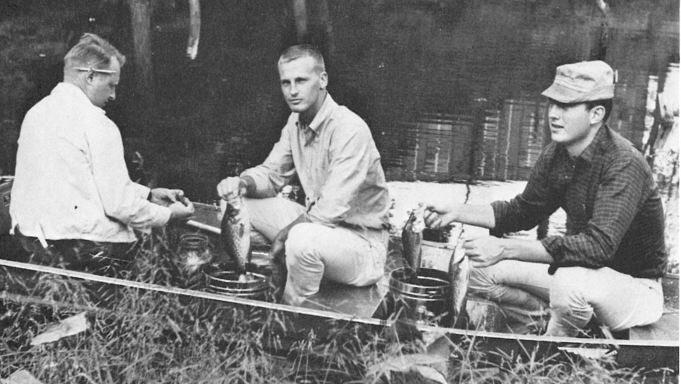 Ken Sandifer (left) with two students conducting field research on poisened fish. Photo from the 1965 Ouachitonian yearbook.