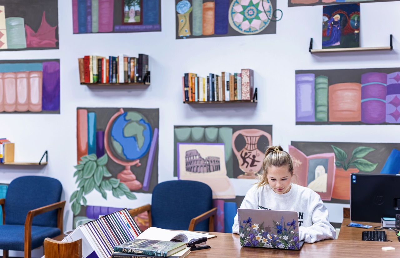 Student working on her laptop