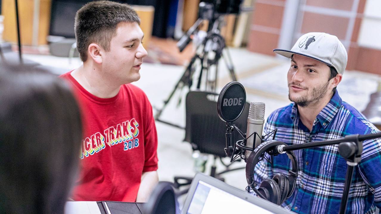 Students recording podcast